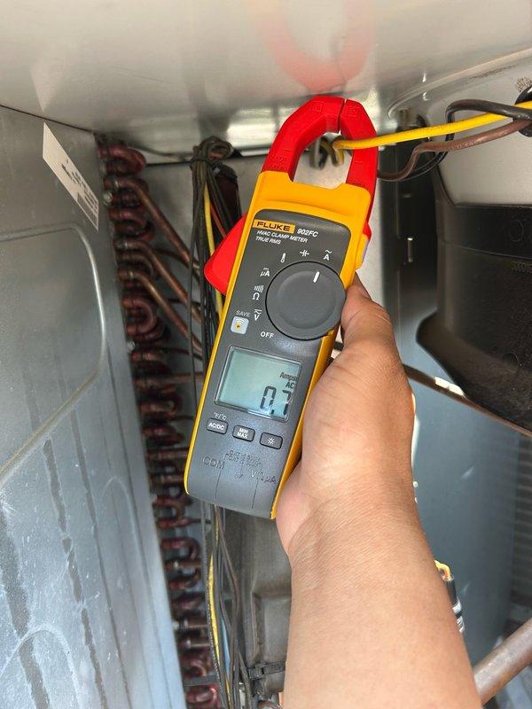 Responded to a no cooling call on a commercial rooftop unit experiencing high pressure lockout and thermostat communication issues. Upon arrival, confirmed the thermostat was calling for cooling but the unit was not responding. Accessed the RTU and discovered the condenser coils were heavily impacted with multiple layers of dirt and debris. Connected refrigerant gauges and measured head pressure exceeding 500 PSI, well above normal operating range. Removed access panels and thoroughly cleaned the condenser coils to restore proper airflow and heat rejection. After cleaning, cycled the unit and rechecked refrigerant pressures, confirming all readings returned to normal operating parameters. Inspected air filters and condensate drain, finding both in acceptable condition with no issues. Verified unit operation with proper cooling cycle and normal system pressures. Unit restored to full operational status.