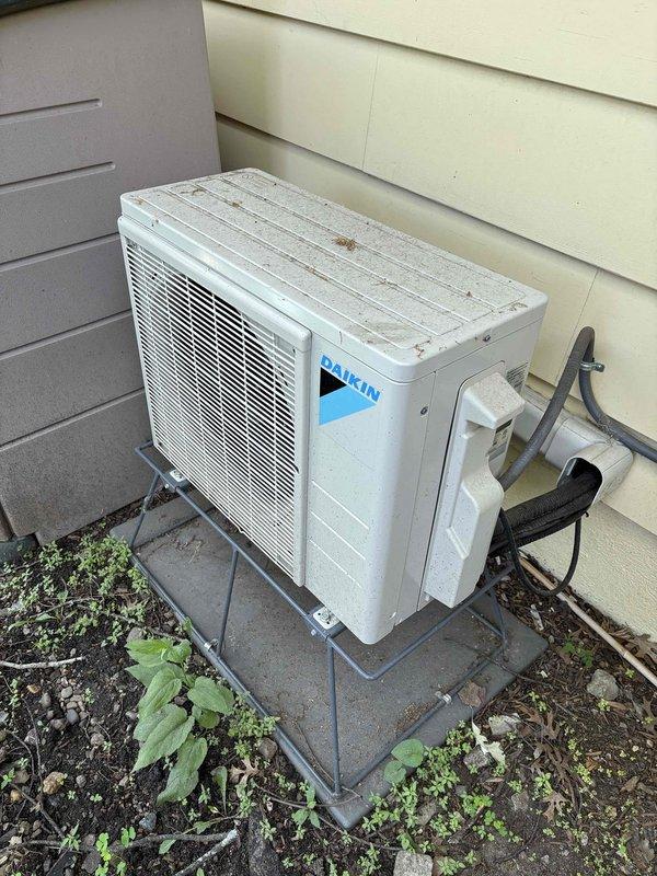 Completed annual cooling maintenance on multi-zone mini split system consisting of two outdoor condensers serving three indoor head units. Performed comprehensive maintenance including filter inspection, thermostat verification, temperature differential measurements, condenser evaluation, and drainage system checks on all zones. All head units confirmed operating with proper cooling capacity and temperature output at time of service.

Identified drainage issue with Mitsubishi head unit in master bedroom during initial inspection due to customer report of water appearing on stairway wall below unit location. Upon further diagnosis, discovered drain line had become disconnected from the head unit, causing improper condensate drainage. Coordinated follow-up visit to reconnect drain line and restore proper drainage function. System otherwise operating within normal parameters.
