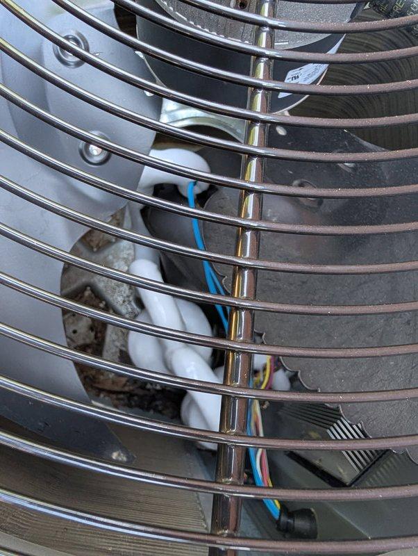Responded to no-cool call with system experiencing ice buildup on indoor evaporator coil. Upon arrival, unit had been shut down to allow thawing. Connected manifold gauges and monitored system operation, observing abnormally high refrigerant pressures. Inspection revealed severely restricted airflow due to heavily contaminated outdoor condenser coil. Performed thorough condenser coil cleaning, which restored proper airflow and normalized system pressures. Monitored system operation for 15 minutes post-cleaning with no ice formation observed on evaporator or refrigerant lines. Verified system cooling properly with normal operating pressures and temperatures.