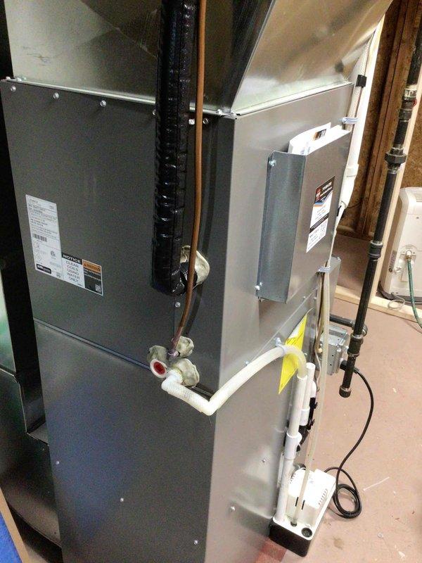 Completed comprehensive air conditioning tune-up on residential split system. Performed exterior coil cleaning on condenser unit, conducted full electrical testing with all readings within manufacturer specifications, and verified system performance with 19-degree temperature differential across the evaporator coil. Unit operating properly with no deficiencies identified.