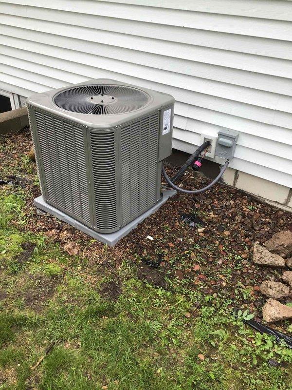 Completed comprehensive air conditioning tune-up on residential split system. Performed exterior coil cleaning on condenser unit, conducted full electrical testing with all readings within manufacturer specifications, and verified system performance with 19-degree temperature differential across the evaporator coil. Unit operating properly with no deficiencies identified.