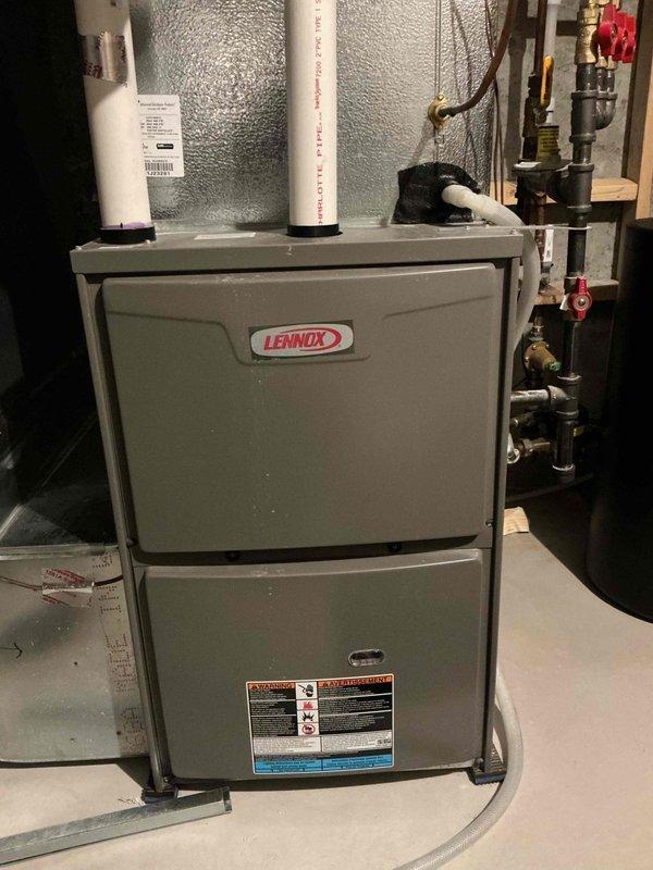 Completed comprehensive tune-up and inspection on Lennox furnace and air conditioning system. System operational upon completion, however inspection revealed capacitor showing signs of wear with 45/5 MFD rating requiring replacement recommendation for optimal performance and reliability. Documentation and photos captured for client records per service agreement requirements.