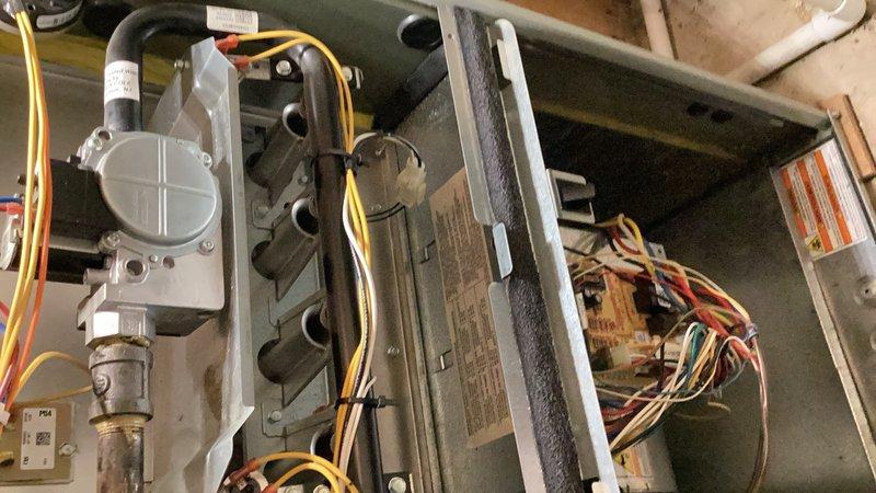 Performed comprehensive system tune-up and inspection for pre-sale home evaluation. Conducted thorough furnace inspection including venting, exhaust flue, burner assembly, heat exchanger camera inspection, blower motor, inducer motor, pressure switch, safety switches, limit switches, flame sensor, and igniter. Verified gas pressures and combustion air supply within specifications. Cycled heating system through all operational modes confirming safe and proper operation.

Completed air conditioning system evaluation including evaporator coil, blower assembly, and condenser unit inspection. Checked contactor, compressor, and all electrical components for proper function. Verified refrigerant charge at correct levels. Replaced air filter with homeowner-supplied filter. Cleaned condenser coil to optimize heat transfer efficiency. Cycled cooling system confirming normal operation across all modes. Both heating and cooling systems operating within manufacturer specifications with no deficienc