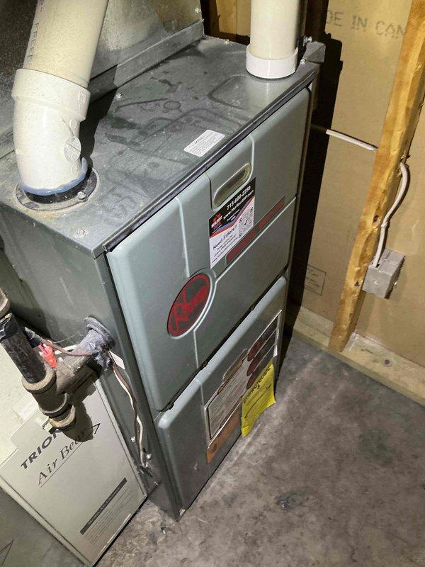Completed first-call AC maintenance tune-up on 25-year-old R22 system. Identified failing contactor and dual capacitor requiring replacement, system low on refrigerant with evidence of previous stop leak use. Documented equipment make, model, and serial numbers with photographs, and recommended comfort advisor consultation due to age of system and multiple component failures.