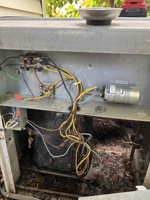 Completed comprehensive A/C maintenance on one R22 condensing unit as part of recurring maintenance agreement. Ambient temperature recorded at 75 degrees. Performed full system inspection including air filter, thermostat operation, temperature differential across evaporator coil, condenser unit components, evaporator and condenser coils, blower motor, outdoor fan motor, dual run capacitor, compressor operation, refrigerant pressures, and condensate drain line.

System inspection revealed low refrigerant charge based on pressure readings and operating characteristics. Unit is utilizing R22 refrigerant in an aging system showing signs of wear and environmental exposure. Interior electrical components and capacitor connections inspected and found operational, though housing showed accumulation of debris and weathering consistent with system age. Condenser coil accessible without ladder and inspected for proper airflow.

Recommended 20x25x4 air filter replacement, which homeowner will hand