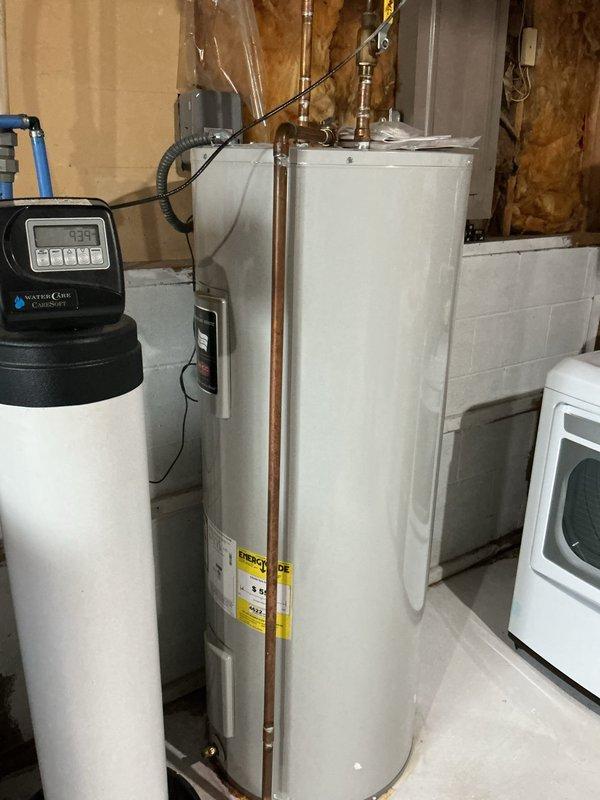 Responded to no hot water complaint with circuit breaker tripping immediately upon reset attempt. Upon inspection, discovered 10-year-old tanked water heater was leaking and causing electrical fault. Removed and replaced failed unit with new water heater, reconnected copper supply and discharge piping, verified all connections for proper seal, restored power, and tested system operation to confirm hot water delivery and no further electrical issues.