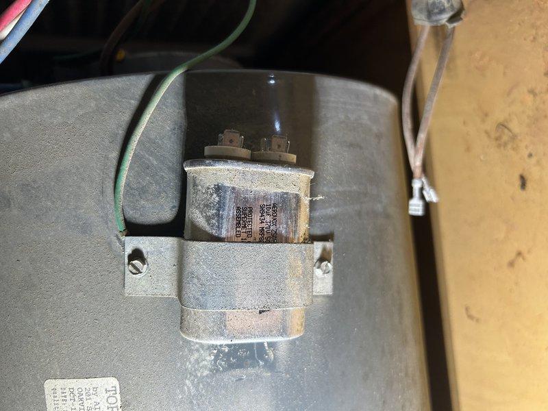 Responded to no cooling complaint on 12-year-old R-22 air conditioning system. Upon arrival, performed diagnostic testing and discovered system was nearly flat on refrigerant. Inspected indoor furnace unit and tested blower motor capacitor, which showed weak readings indicating potential failure. Verified air filter was clean and in acceptable condition. Provided homeowner with repair options for R-22 refrigerant recharge and system repairs, and coordinated with service advisor to schedule estimate for complete system replacement due to age of equipment and obsolete refrigerant type.