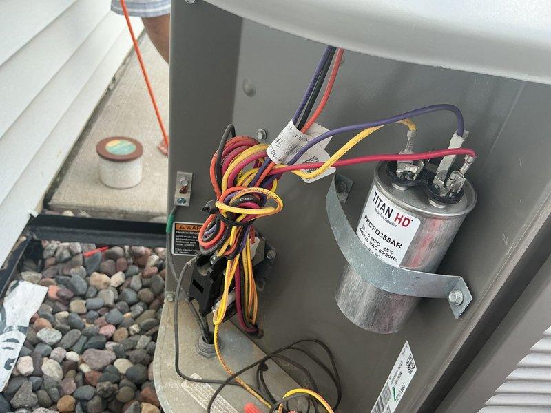 Responded to no cooling call on 2021 Lennox unit still under warranty. Upon arrival, confirmed compressor was running but condenser fan motor had failed and was not spinning. Replaced defective condenser fan motor with new unit, verified proper operation of fan and airflow, and tested system performance to ensure unit was cooling properly.