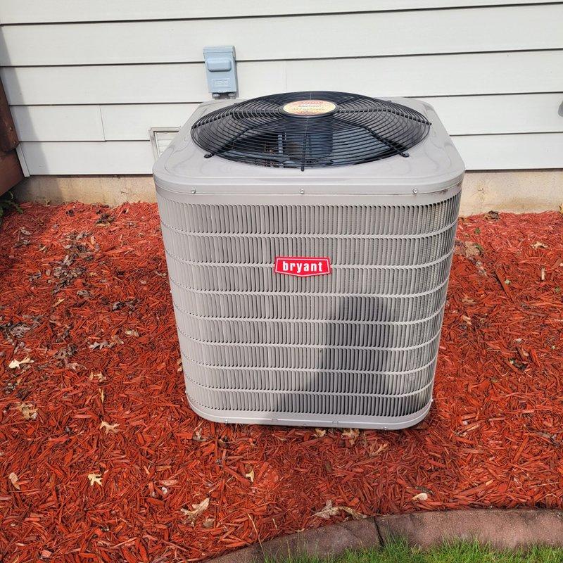 Responded to no cooling call on 8-year-old Bryant system. Upon arrival, found outdoor unit attempting to start but only producing humming sound while condenser fan ran. Diagnosed faulty capacitor preventing compressor from starting. Replaced defective dual run capacitor with proper replacement part, restored power, and tested system operation. Confirmed compressor and condenser fan motor operating correctly with proper amp draws and verified system cooling effectively.