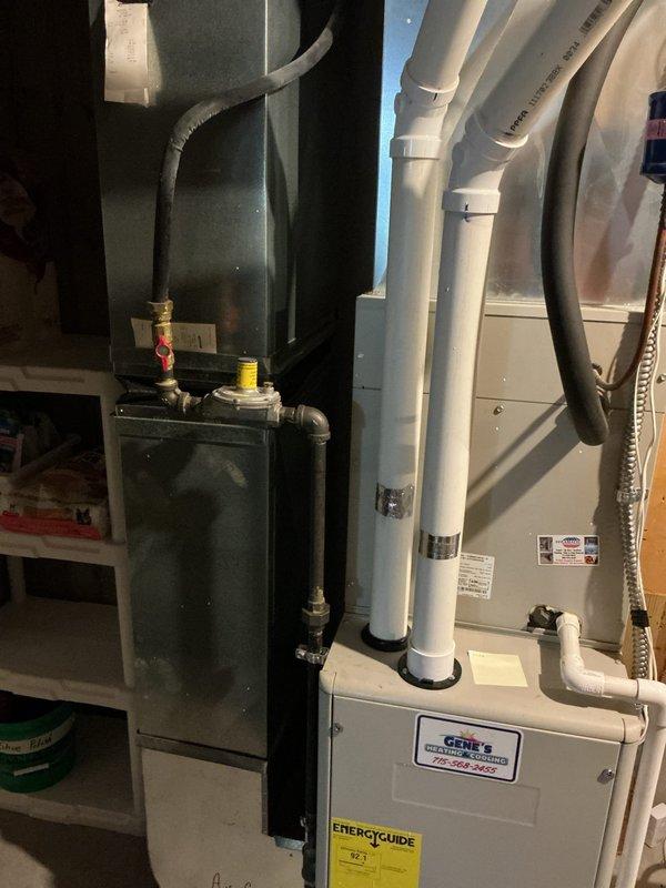 Responded to outdoor hose bibb leaking during use and behind the wall unit, an ongoing issue for approximately six years. Upon inspection, identified loose vacuum breaker as the source of the leak. Tightened and tested the vacuum breaker assembly to ensure proper seal and function. Leak successfully resolved. Additionally provided tankless water heater system information and estimate per customer request.