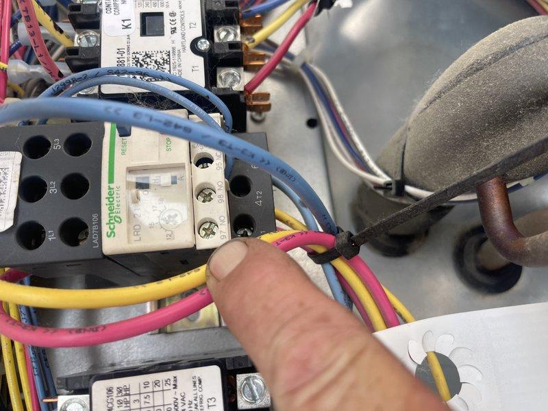 Responded to no cooling complaint on commercial rooftop unit. Found unit locked out on fault code 42 due to tripped three-phase motor relay, likely caused by power outage earlier in the day. Reset motor protection relay and monitored system operation for 35 minutes to verify proper functionality. Unit returned to normal cooling operation. Noted dirty filters requiring replacement by facility management. Control panel displayed dehumidification mode with humidity reading at 48.8%. All electrical connections inspected and secured during troubleshooting.