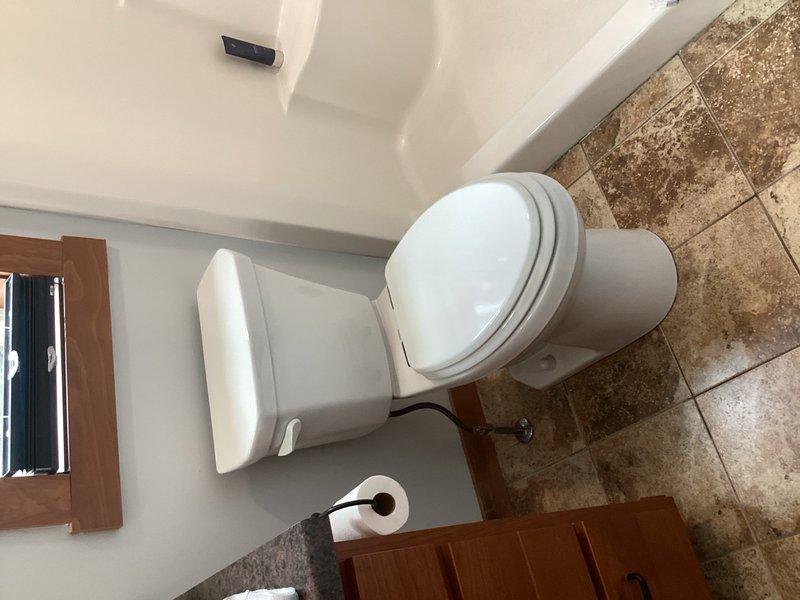 Completed installation of two ADA-compliant comfort height toilets in separate bathroom locations. Removed existing fixtures, installed new wax rings and mounting bolts, and secured both units to proper specifications. All installations were scheduled after 2pm to accommodate the customer's in-home daycare operations during nap time, ensuring minimal disruption to daily activities.