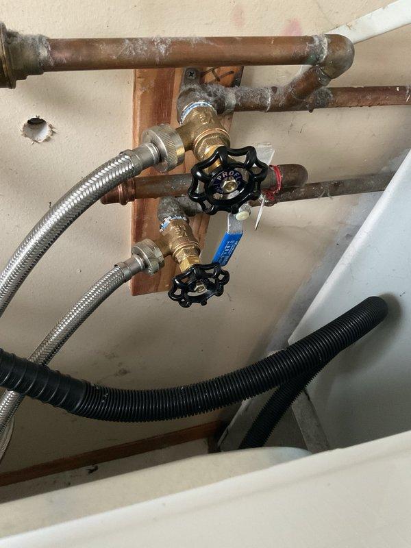 Replaced a failing water control valve up to 1" on the plumbing system. The existing gate valve was no longer functioning properly to control water flow through the line. Installed a new ball, gate, swing, spring, or check valve assembly as needed to restore proper water flow control. The replacement valve was mounted on the copper piping system with brass threaded fittings and connectors, secured to the wooden backing board. Verified proper operation of the new valve and confirmed no leaks at connection points. The repair successfully restored reliable water flow control capability to the system.