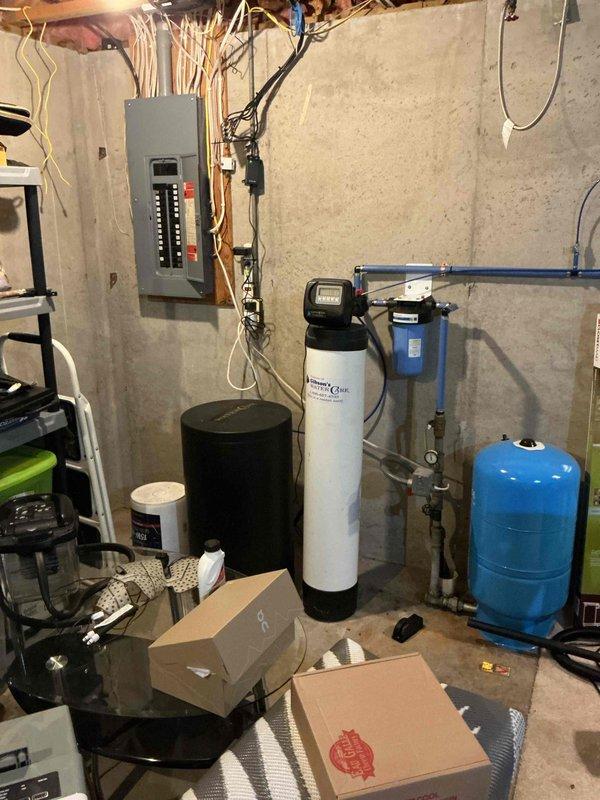 Responded to service call for gas water heater repeatedly cycling off and tripping breaker. Upon arrival, inspected 16-year-old unit and identified faulty gas valve operation. Reset gas valve and successfully restored unit to operational status. Documented existing equipment and utility room configuration with photos. Provided replacement estimate due to age of unit and uncertain longevity of current repair, as temporary fix may not provide long-term reliability given the advanced age of the water heater.