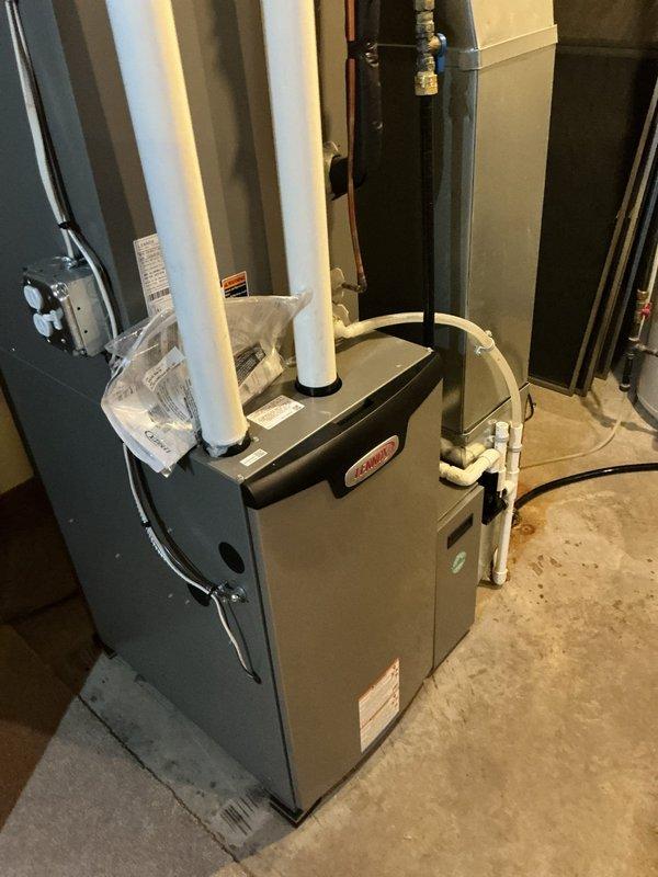 Responded to service call for gas water heater repeatedly cycling off and tripping breaker. Upon arrival, inspected 16-year-old unit and identified faulty gas valve operation. Reset gas valve and successfully restored unit to operational status. Documented existing equipment and utility room configuration with photos. Provided replacement estimate due to age of unit and uncertain longevity of current repair, as temporary fix may not provide long-term reliability given the advanced age of the water heater.