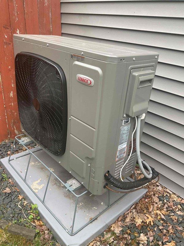 Responded to callback for Lennox heat pump not cooling adequately and failing to enter second stage operation. Unit was recently installed and is experiencing issues consistent with other installations from the same period. Performed diagnostic assessment and documented unit condition with photos. Unable to complete full diagnosis without Lennox technical support consultation. Identified need to determine whether heat pump replacement or control board replacement is required to resolve cooling deficiency. Follow-up visit scheduled pending manufacturer technical support guidance.