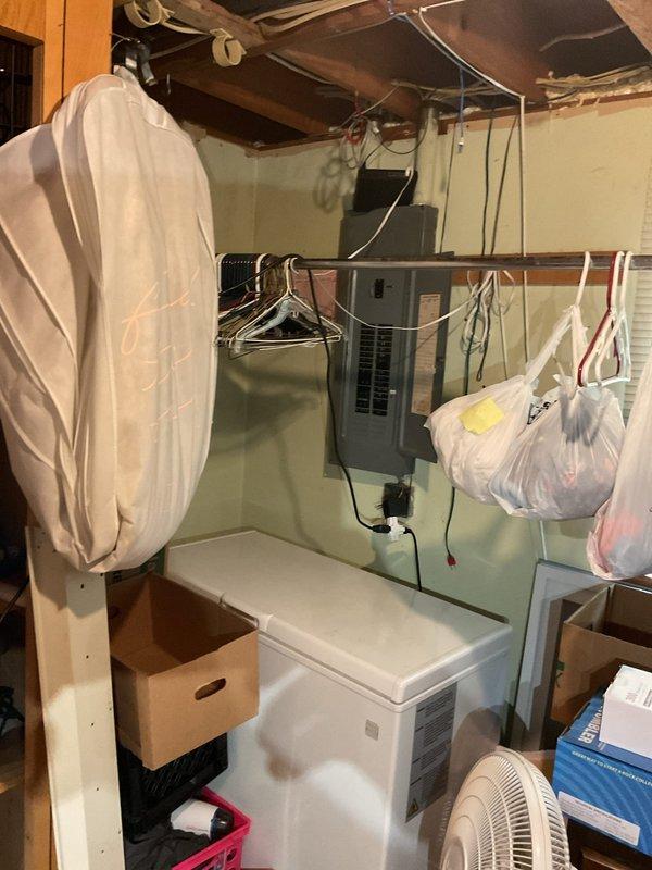 Responded to service call for 2019 Lennox air conditioning system with water leakage issue. Upon arrival, unit was off and water was present on floor. Removed access panel to inspect evaporator coil and drain system. Performed diagnostic water test on drain pan which revealed complete blockage preventing proper drainage. Located obstruction in barb fitting of condensate drain line. Cleared blockage from barb fitting using compressed air and thoroughly flushed drain pan to remove accumulated debris. Restored unit to operation and monitored condensate drainage system to verify proper flow and function. System cooling normally with condensate draining as designed.