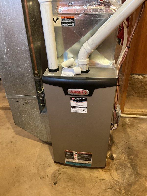Performed comprehensive AC tune-up on 11-year-old system. Verified air filter condition and confirmed evaporator drain was clear and functioning properly. Removed condenser panels, performed coil cleaning, and conducted capacitor inspection which revealed weakened fan-side capacitor. Replaced faulty capacitor, completed system startup, verified refrigerant pressures within specifications, and confirmed proper operation with 20-degree temperature split across evaporator coil.