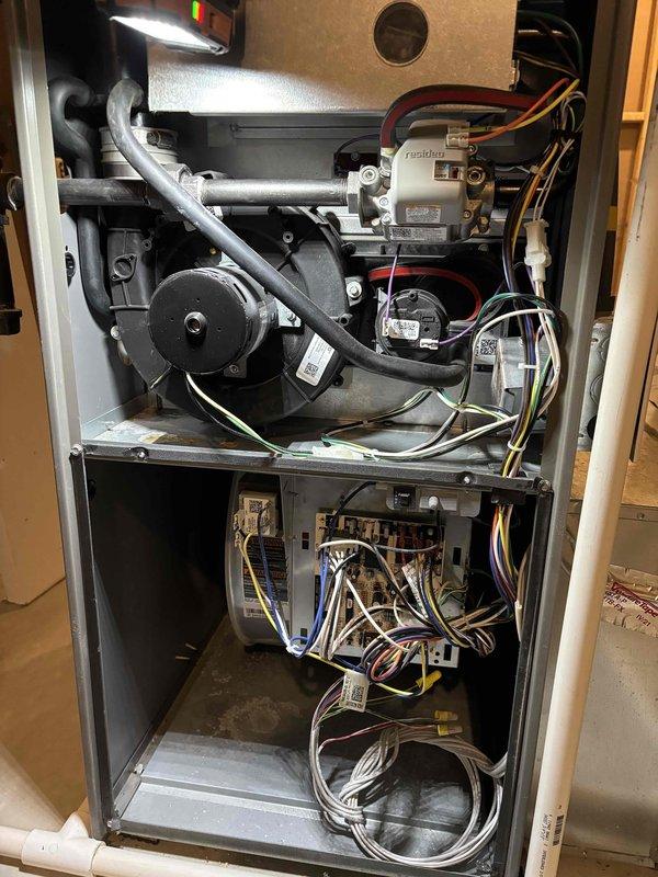 Performed comprehensive AC maintenance on single condenser unit with R-410A refrigerant. Conducted full system inspection including air filter, thermostat operation, condenser unit, evaporator and condenser coils, blower motor, capacitors, compressor, refrigerant levels, and condensate drain line. Readjusted blower motor speed to high setting for optimal cooling performance. Measured temperature split at 13 degrees with ambient outdoor temperature of 65 degrees. System pressure readings and temperature differential indicated potential minor refrigerant deficiency. Provided repair estimate for refrigerant recharge, which was declined. Advised homeowner to monitor system performance and cooling efficiency for any operational changes. System currently operational but may experience reduced efficiency if refrigerant level continues to decline.