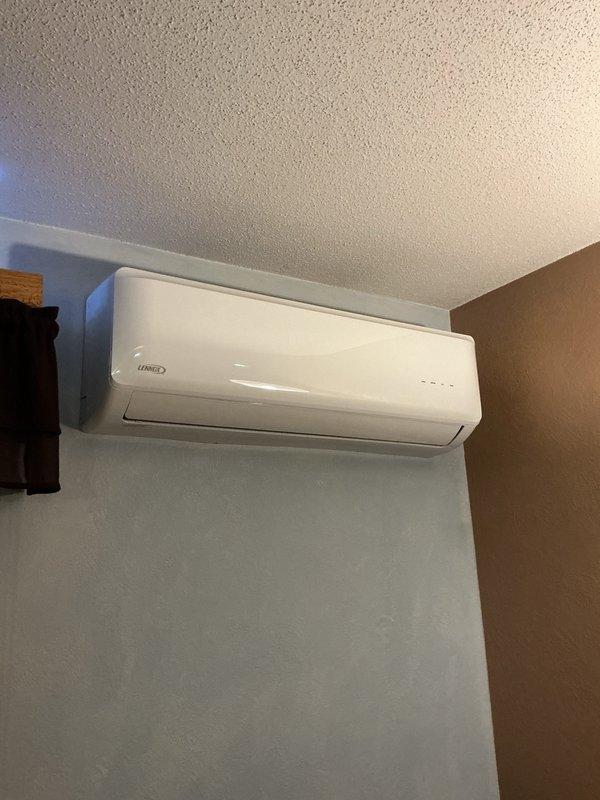 Completed Family Rewards cooling maintenance visit on Lennox ductless mini-split system. Performed comprehensive tune-up including cleaning indoor unit air filters and inspecting blower wheel assembly, which were found to be in clean condition. Inspected outdoor condenser unit for rodent intrusion and debris—no issues detected. Rinsed condenser coil to ensure optimal heat transfer efficiency. Started system and verified proper operation with 20-degree temperature differential across the evaporator coil, confirming unit is performing within manufacturer specifications. All components operating normally with no deficiencies noted.
