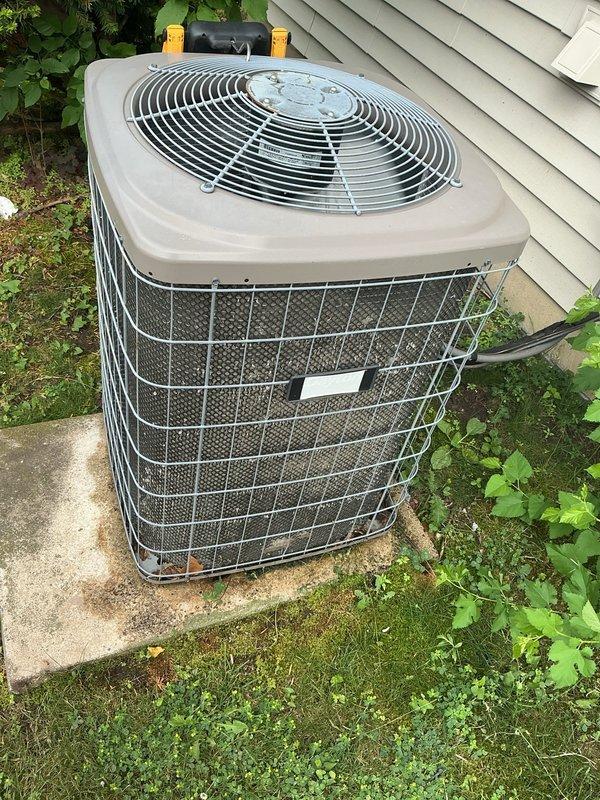 Responded to no cooling complaint on residential air conditioning system. Upon inspection, confirmed system was low on refrigerant with subcooling reading below 1°F. Found outdoor condenser coils heavily clogged with debris, causing elevated head pressure and masking true refrigerant charge level. System utilizes obsolete R22 refrigerant. Due to age of equipment (10+ years), refrigerant type, and condition of outdoor coil, recommended full system replacement. Scheduled replacement estimate for following day.