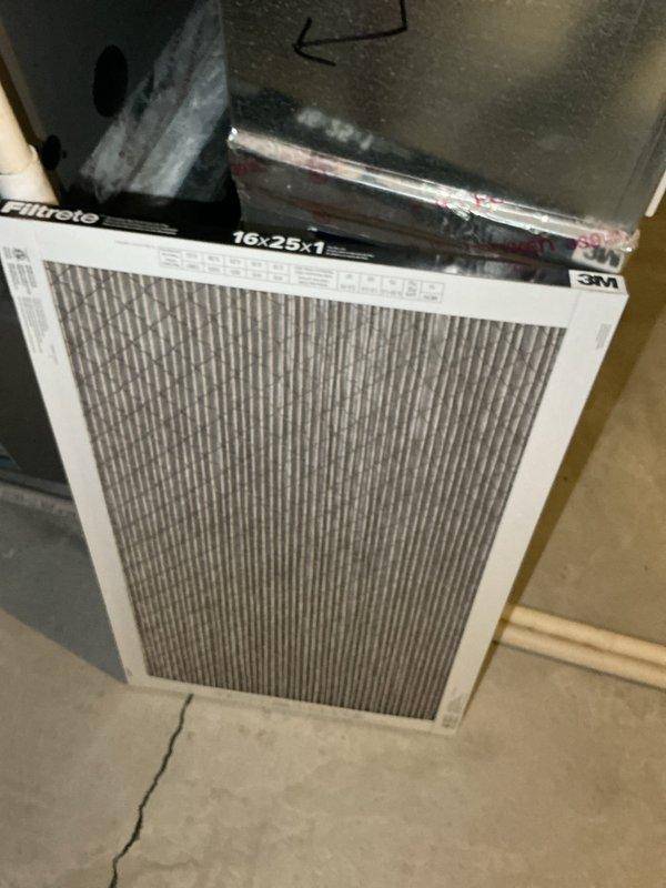 Completed comprehensive AC tune-up on 14-year-old residential cooling system. All components tested within manufacturer specifications, refrigerant charge verified at proper levels, and system operational performance confirmed. Outdoor condenser coils found heavily soiled requiring full disassembly for thorough cleaning to restore optimal heat transfer efficiency and extend equipment lifespan. Identified air-restrictive furnace filter (high MERV rating) limiting airflow; recommended switching to MERV 7-8 rated filter with monthly replacement schedule to improve system performance and reduce strain on blower motor.