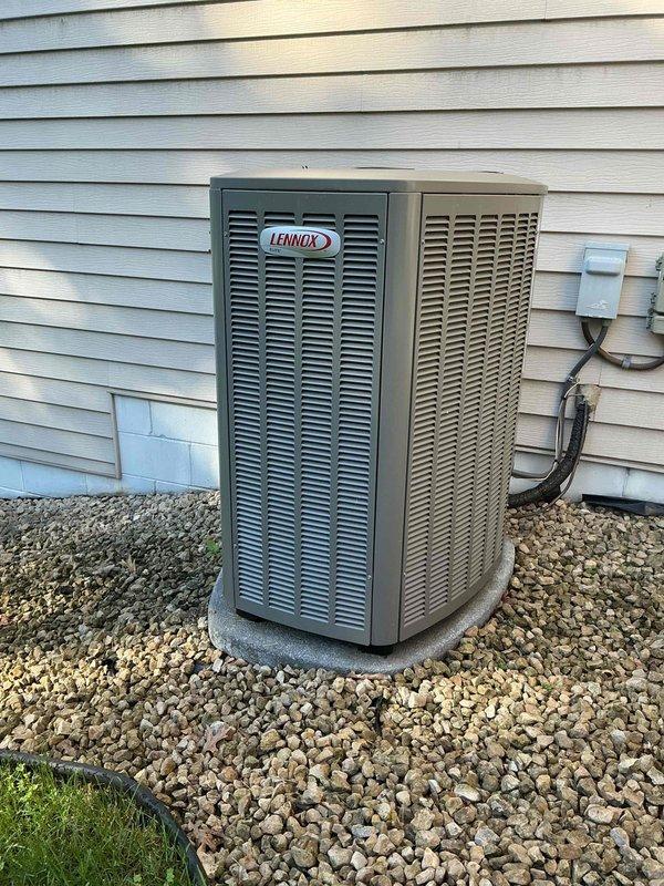 Performed comprehensive preventive maintenance inspection on 1-year-old Lennox air conditioning system. Verified contactor operation, tested capacitor values within manufacturer specifications, and confirmed refrigerant charge at proper levels. Inspected condenser coil found to be mostly clean with adequate airflow, examined outdoor and furnace control boards confirming proper operation, and verified blower wheel cleanliness. Measured temperature drop across evaporator coil at 18 degrees, within acceptable range for optimal cooling performance. Noted air filter requires replacement due to dirt accumulation. All system components operating as designed with no deficiencies requiring immediate attention.