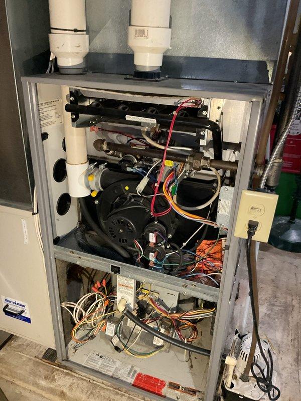 Responded to no heating or cooling complaint on a 2004 geothermal heat pump system. Upon arrival, confirmed unit was completely evacuated of refrigerant charge. Conducted thorough leak search and inspection for oil residue throughout accessible components and connections with no definitive leak source identified. Given the age of the system, extensive diagnostic work would be required to locate the leak, followed by repair, pressure testing, evacuation, and complete refrigerant recharge. After reviewing the scope of work and costs involved for diagnosis and repair on the 20-year-old unit with uncertain repair outcomes, recommended system replacement as the most cost-effective solution. Coordinated with sales team to schedule consultation for replacement options. Documented equipment condition with photographs.