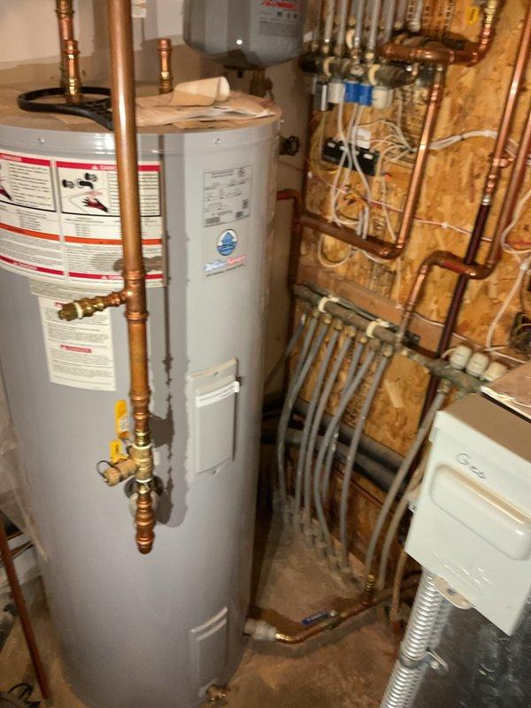 Met with prospective homeowner and realtor at property being sold to provide consultation on geothermal heating system. Explained system operation, components, and functionality of the geo unit in response to questions from potential buyer. Provided overview of mechanical room equipment including water heaters, copper piping distribution manifolds, and associated plumbing infrastructure to familiarize new owner with the system layout and basic operation.