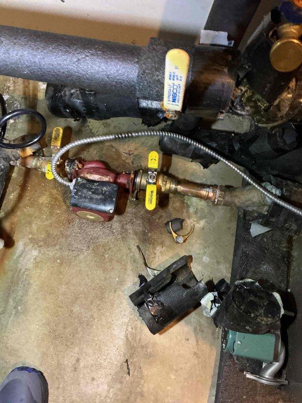 Responded to no water pressure call throughout entire house related to geothermal heating system. Upon inspection, identified failed pump flange on geothermal circulation pump that had been installed three years prior. Documented existing hydronic system configuration including circulator pumps, brass valving, insulated supply lines, and geothermal system components. Coordinated scheduling with geothermal specialist for pump flange replacement and system restoration.