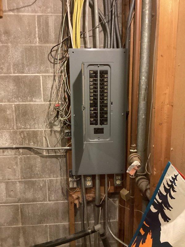 Responded to no cooling complaint on commercial RTU with weak airflow. Upon inspection, found condenser coil heavily clogged with cottonwood debris and completely restricted air filters. Cleaned condenser coil using buckets of water and power sprayer to remove debris buildup. Removed clogged filters and discovered evaporator coil completely frozen. Set system to fan-only mode to thaw evaporator coil. Advised customer that follow-up visit required to verify refrigerant charge once coil is fully thawed and to install two 18x20x2 replacement filters and perform evaporator coil cleaning with no-rinse cleaner.