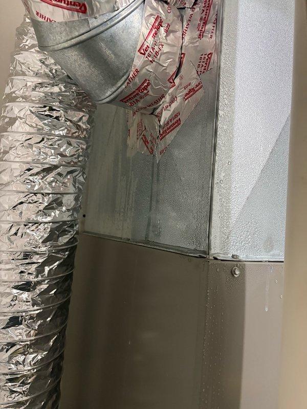 Responded to service call for excessive condensation in second-floor furnace causing water damage and potential mold concerns in rooms below. Performed comprehensive system diagnostics including refrigerant level verification, evaporator coil inspection for ice buildup, air filter condition check, and blower speed assessment—all components found operating within normal parameters. Identified air exchanger as source of problem, drawing high humidity from outside air into HVAC system during warm weather operation, resulting in condensation accumulation. Deactivated air exchanger and advised keeping unit off during summer months. Recommended installation of dehumidifier in furnace room to prevent future moisture issues.