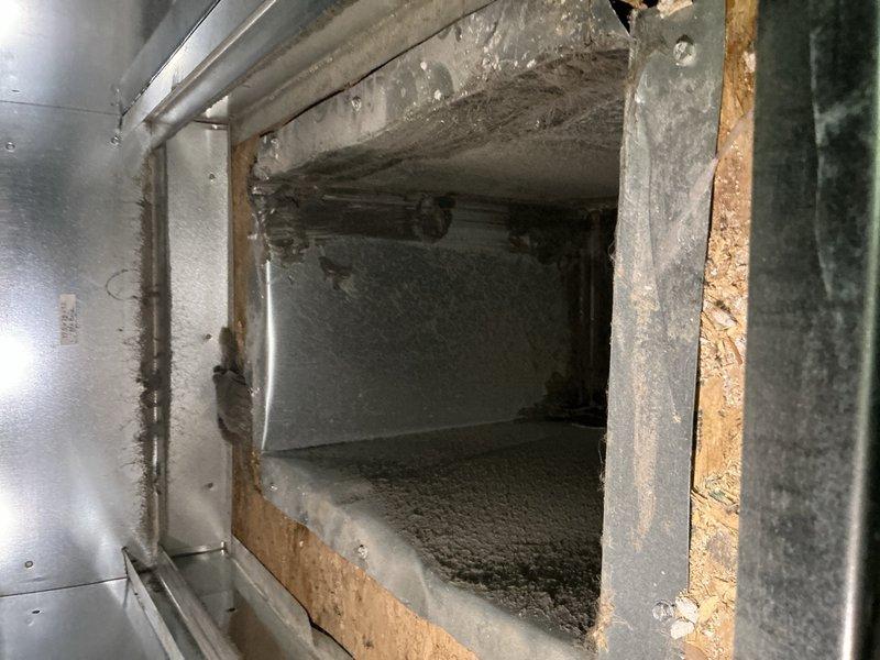 Responded to service call for excessive condensation in second-floor furnace causing water damage and potential mold concerns in rooms below. Performed comprehensive system diagnostics including refrigerant level verification, evaporator coil inspection for ice buildup, air filter condition check, and blower speed assessment—all components found operating within normal parameters. Identified air exchanger as source of problem, drawing high humidity from outside air into HVAC system during warm weather operation, resulting in condensation accumulation. Deactivated air exchanger and advised keeping unit off during summer months. Recommended installation of dehumidifier in furnace room to prevent future moisture issues.