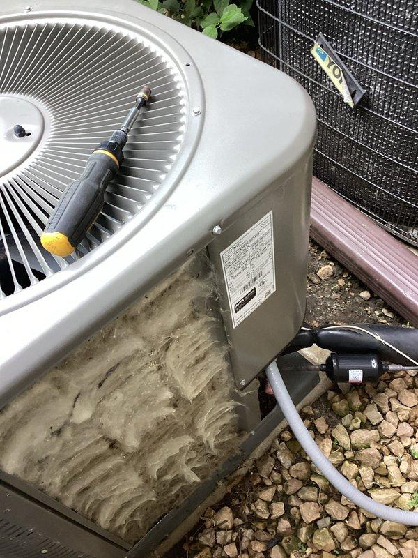 Responded to no cooling complaint for second opinion evaluation. Found system with abnormal pressures (450 psi high side, 50 psi low side) causing evaporator coil freeze-up. Diagnosed low refrigerant charge as primary issue. Recharged system to manufacturer specifications and added UV dye to aid in future leak detection if necessary. System operational upon departure.