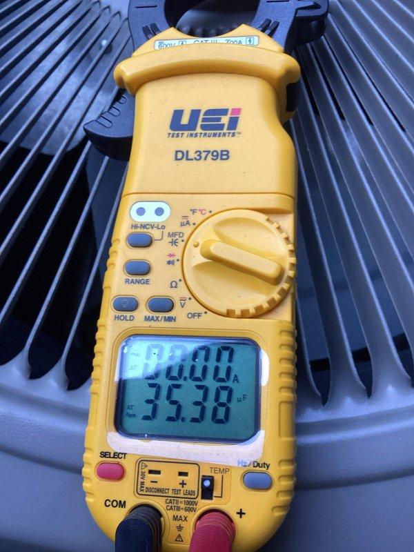 Responded to no cooling complaint for second opinion evaluation. Found system with abnormal pressures (450 psi high side, 50 psi low side) causing evaporator coil freeze-up. Diagnosed low refrigerant charge as primary issue. Recharged system to manufacturer specifications and added UV dye to aid in future leak detection if necessary. System operational upon departure.