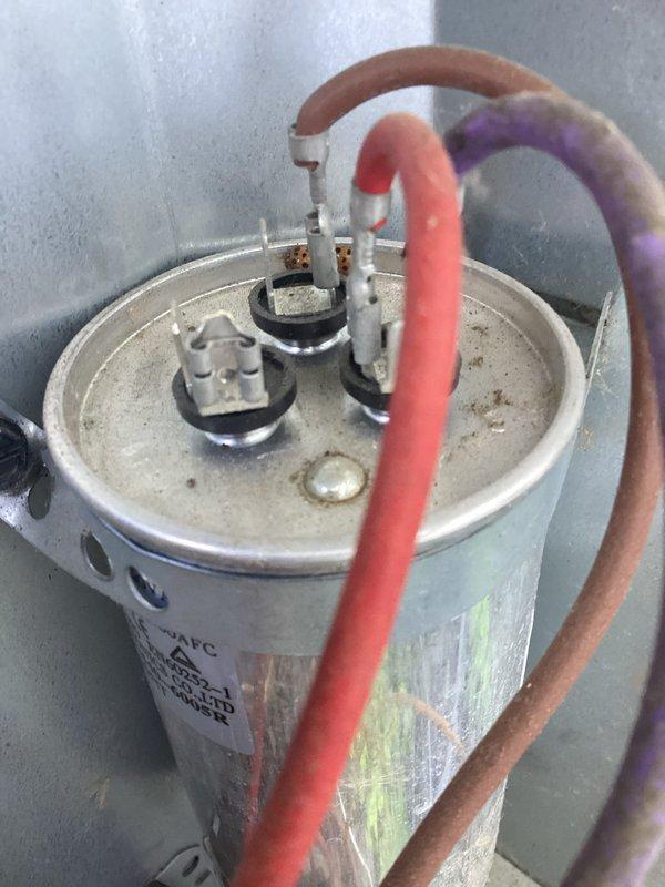 Responded to no cooling call on residential split system AC unit. Upon inspection, found weak capacitor and compressor windings beginning to fail on R22 system. Diagnosed failing compressor through electrical testing and determined system was beyond economical repair due to age and refrigerant type. Discussed replacement options with homeowner for aging R22 equipment.