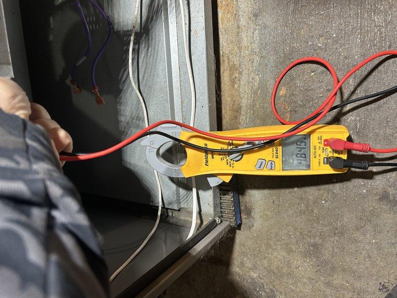 Completed comprehensive air conditioning tune-up on single-system residential unit. Tested system operation and confirmed proper temperature drop in basement zone. Inspected and verified air filter condition, blower motor, and blower capacitor all operating within normal parameters. Performed condenser coil cleaning to remove debris accumulation and verified all outdoor unit components functioning correctly. Electrical measurements confirmed appropriate amperage draw. Recommended replacement of deteriorated suction line insulation on refrigerant piping leading to outdoor unit, as existing insulation has completely degraded. System operating efficiently with no immediate service concerns identified.