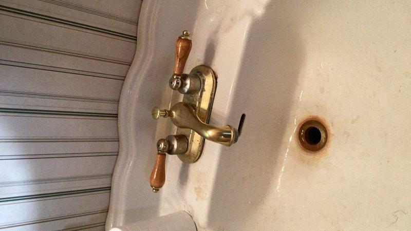Completed recurring plumbing inspection and addressed leaking outdoor hose bibb that was spraying water from the top connection. Removed and replaced defective hose bibb with new unit, ensuring proper seal and function. Interior plumbing fixtures including toilet, sink, and bathtub were inspected and photographed as part of routine maintenance evaluation.