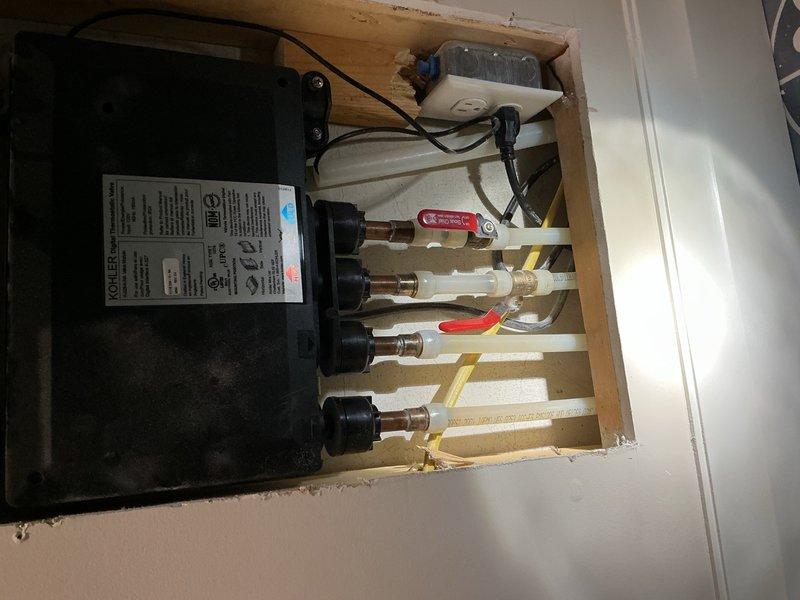 Responded to service call for Kohler DTV electronic shower system approximately 6 years old with no hot water output. Performed diagnostic inspection of the digital thermostatic valve assembly, checking water flow and inspecting inlet screens for debris or blockage. Verified proper water supply pressure to both hot and cold lines and confirmed all shut-off valves were fully operational. Inspected plumbing manifold connections, PEX supply lines, and electrical components within wall cavity. All screens were clear and water flow was adequate to system. Based on diagnostic findings and consultation with manufacturer support, determined thermistor sensor requires replacement. Customer will order OEM thermistor part directly and schedule follow-up appointment for installation of component.