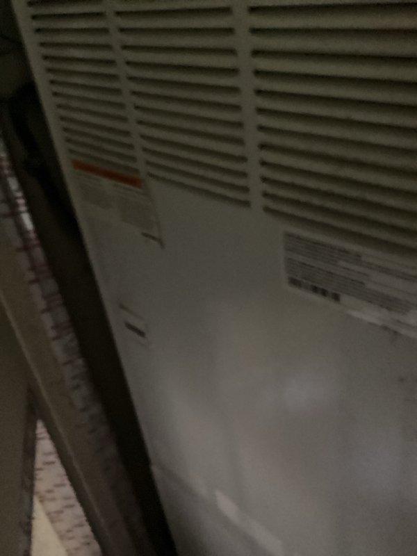 Responded to no hot water call and diagnosed 15+ year old 40-gallon gas water heater with pilot light failure and active leaking at the bottom of the tank. Due to age of unit and severity of leak, provided estimate for replacement with 50-gallon power vent water heater. Documented existing equipment condition with photos for customer records.