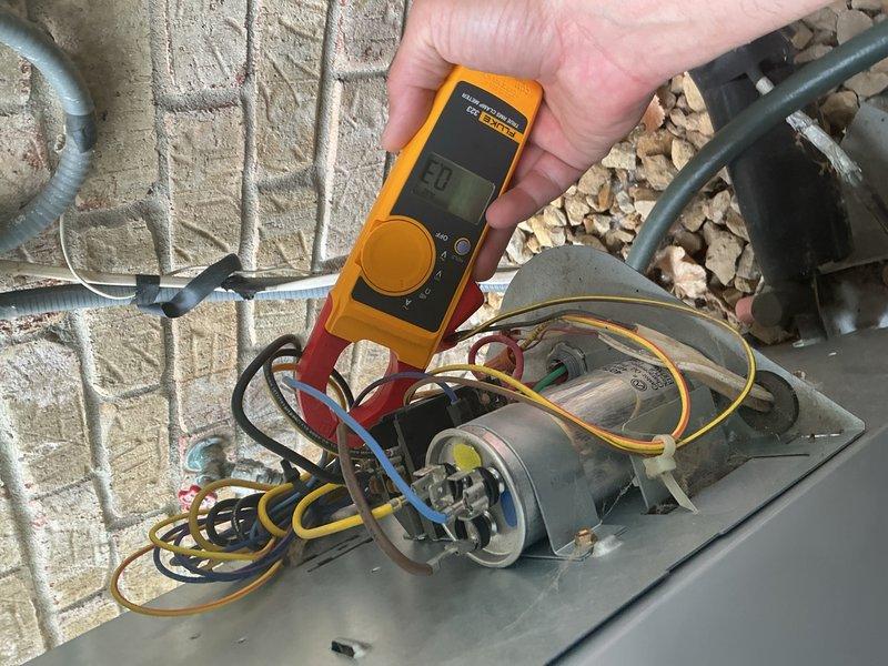 Performed comprehensive preventive maintenance on 4-year-old air conditioning system with no reported issues. Inspected all system components including motor electrical properties, verified refrigerant charge levels, cleaned outdoor condenser coils, measured capacitor performance, and confirmed proper temperature differential across the system. All components tested within normal operating parameters and unit is functioning properly.