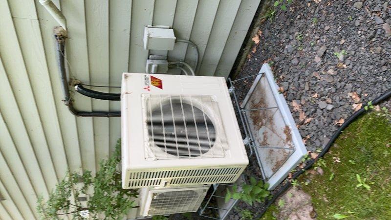 Completed annual cooling maintenance on two systems: Mitsubishi mini-split heat pump and Daikin forced air heat pump. Performed comprehensive inspection of both outdoor condensing units, including coil cleaning and refrigerant level verification. Inspected mini-split head unit and forced air handler, confirming proper operation of both systems. Noted 20x25x5 air filter in ductwork requires replacement. All equipment operating within normal parameters with no deficiencies found.