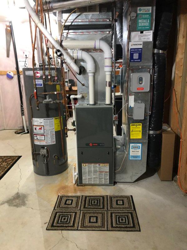 Completed routine spring maintenance tune-up on residential air conditioning system and furnace. During inspection, discovered a cracked heat exchanger in the furnace, which poses a safety hazard and requires immediate replacement. Performed comprehensive system evaluation of both HVAC units, with outdoor condenser unit and indoor equipment found otherwise operational per annual preventive maintenance agreement.