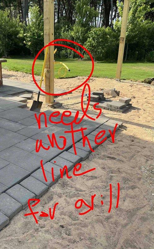 Completed gas line assessment for residential property with existing underground gas lines requiring connection to fireplace and grill appliances. Inspected basement utility area where new gas line attachment point was identified at home connection. Verified existing underground gas line infrastructure and evaluated connections for outdoor grill and sink installations. Documented current plumbing configuration including exposed PVC drain lines and determined additional gas line routing required for proper grill connection in outdoor patio area. Recommended licensed plumber verify all gas line connections, pressure regulators, and sizing to ensure compliance with local codes and safety regulations before final hookup of both appliances.