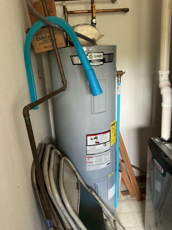 Completed comprehensive AC tune-up on Lennox condensing unit as part of maintenance agreement. Replaced indoor air filter, verified evaporator drain line proper operation, removed condenser panels and thoroughly cleaned condenser coil which showed significant buildup from four years without service. Inspected electrical components including capacitor (within specification) and contactor (good condition). Addressed homeowner concern regarding unusual noise during unit shutdown, identified as refrigerant flow noise due to dirty condenser coil restricting airflow. System startup confirmed proper operation with 22-degree temperature split across evaporator coil, indicating adequate cooling performance and refrigerant charge.