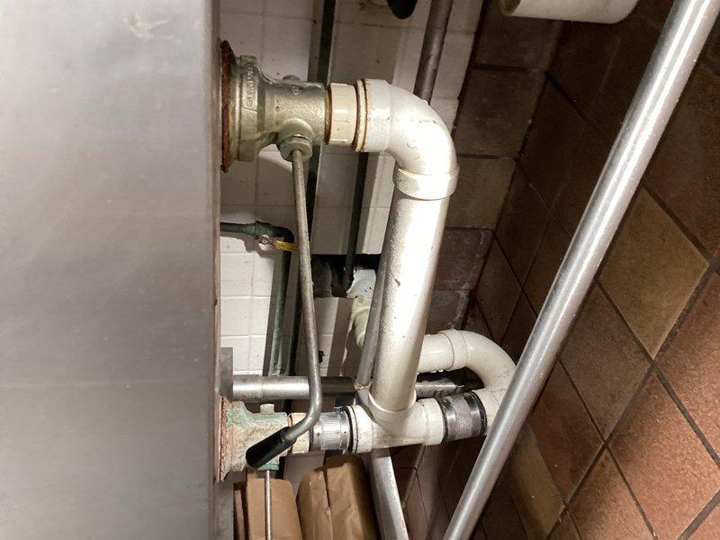 Responded to water leak behind dishwasher caused by pinhole in copper supply line. Removed and replaced 10 feet of deteriorated copper piping with PEX tubing, ensuring proper connections and system integrity. Tested installation for leaks and verified proper water flow to dishwasher upon completion.