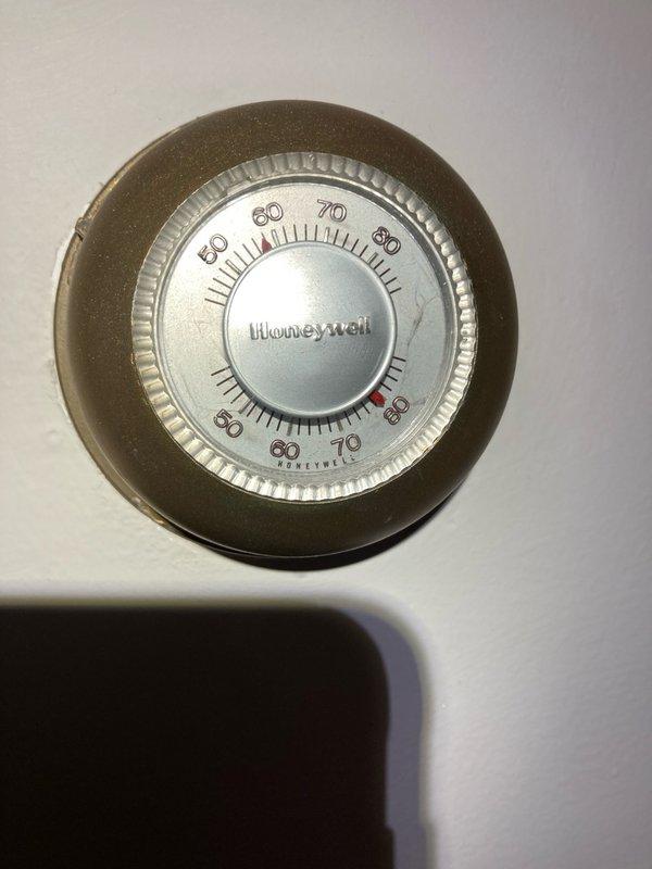 Responded to no cooling call and inspected thermostat and outdoor contactor. Discovered absence of 240V power at the disconnect box, preventing AC unit operation. Advised that an electrician is scheduled to diagnose and repair the electrical issue, and a follow-up visit will be required to test and verify proper system operation once power is restored.
