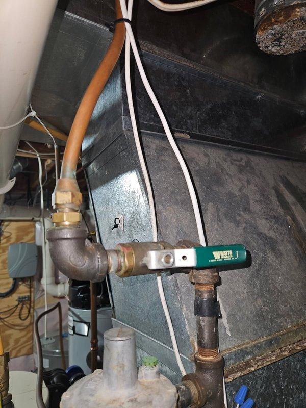 Responded to service call for gas line disconnection due to kitchen appliance conversion from gas cooktop to electric convection oven. Disconnected gas supply line at island location and traced line back to main supply connection near furnace. Removed gas line from supply point and properly capped connection at furnace using appropriate brass fittings. Capped both ends of disconnected gas line to preserve for potential future use. Performed comprehensive leak check on all capped connections using approved testing methods to verify system integrity and safe operation. All connections tested and confirmed secure with no gas leaks detected.