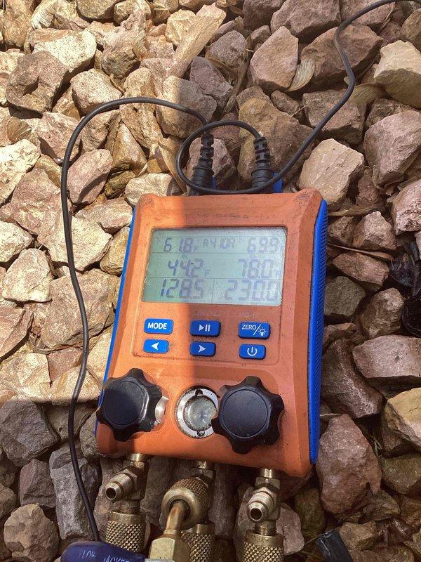 Completed comprehensive air conditioning tuneup on 4-year-old system. Performed standard maintenance procedures including refrigerant pressure and temperature readings, electrical system inspection at breaker panel, and full system diagnostics. All components operating within normal parameters with no deficiencies noted.