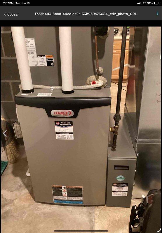 Responded to a leak reported under a recently installed bathroom faucet at the shut-off valve connection. Upon inspection, discovered that supply lines were only hand-tightened and both sink faucets were improperly secured to the mounting surface. Properly tightened all supply line connections to manufacturer specifications and secured both faucet units to eliminate movement and prevent future leaks.